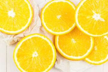 Round orange slices on the table.