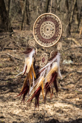 Handmade dream catcher with feathers threads and beads rope hanging