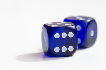 Blue gambling dice on table
