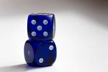 Blue gambling dice on table