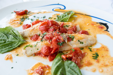 Cod with tomato and basil