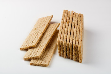 Wheat-oatmeal loafs on white background