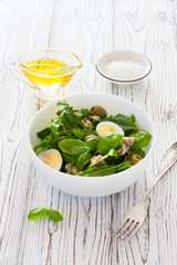 Mediterranean-style salad with lettuce, tuna, chicken eggs