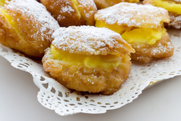 Handmade krapfen filled with pastry cream