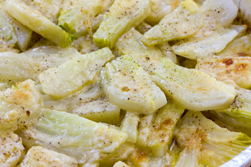 Fennel cooked in a pan with cheese