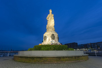 Fototapeta na wymiar Statue of the Carmen's Virgin, Santurtzi, Bizkaia, Spain