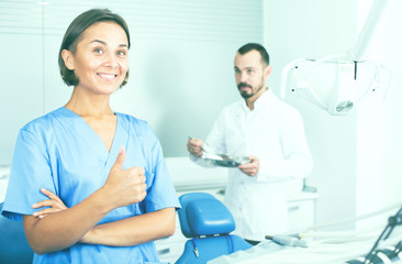 Obraz premium Portrait of dentist and assistant