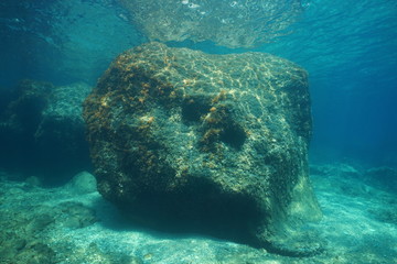 A large rock underwater below water surface in the Mediterranean sea, Costa Brava, Cap de Creus, Catalonia, Spain