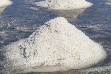 Raw salt or pile of salt from sea water in evaporation; ponds at Phetchaburi province,Thailand