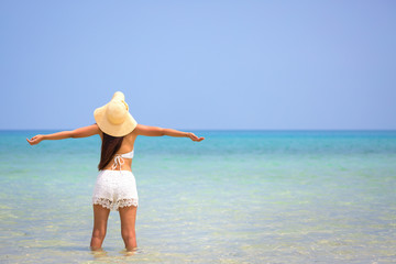 Woman on beach in summer