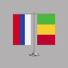 Table stand with flags of Russia and Mali.Two flag. Flag pole. Symbolizing the cooperation between the two countries.Table flags