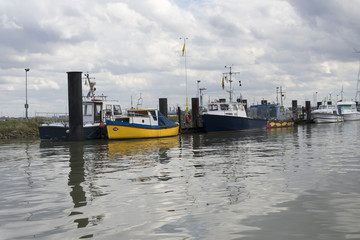 Boats on the side of the small port