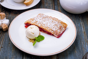 Cherry strudel with ice cream