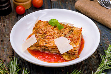 Parmigiano eggplant on white plate