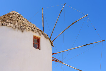 Details of traditional whitewashed windmill. Mykons island, Greece © vivoo
