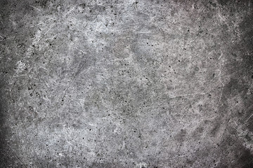 Fototapeta na wymiar Metal plate silvery as a background, worn aluminum texture
