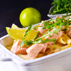 Salmon with penne noodle and arugula