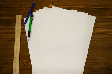 Blank page paper sheet on office or student desk table. Education background. wilh copy space. to do list. Goals.