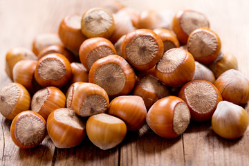 hazelnuts on a wooden table