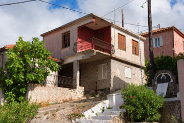 Typical small greek house on a sunny summer day at Keri village, Zakynthos island, Greece.