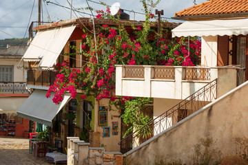 Fototapeta na wymiar Typical small house on a sunny summer day at Keri village, Zakynthos island, Greece.