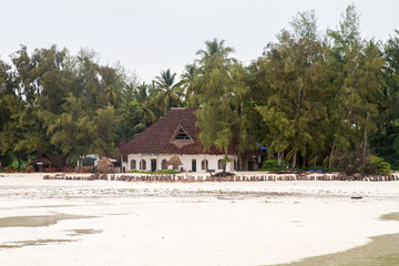 Landscape with sparkling blue water off the white beaches of the Indian Ocean spice island of Zanzibar (Unguja), Tanzania