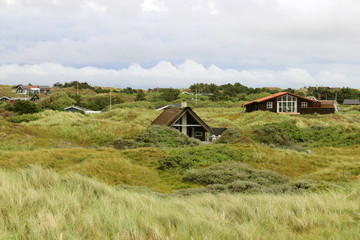 Typical scandinavian holiday house in Denmark. Island Fanoe. North Sea.