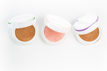 Refills of foundation and highlighter cushion on a white background