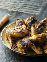 plate of barbecue chicken wing