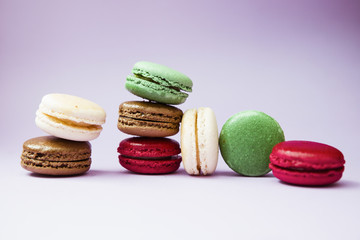 macarons on purple background