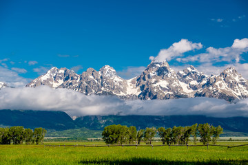 Grand Teton Mountains with low clouds