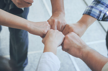 group of diversity multiethnic people hands bump for relationship and together teamwork concept.