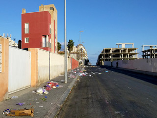 Garbage on the street of Torrevieja city after morning market. Spain