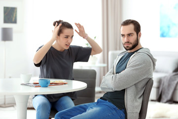 Young couple having argument at home