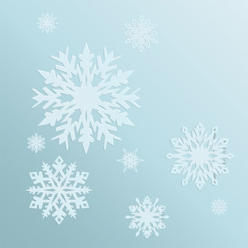 blue background with snowflakes in a cold winter. A card for Christmas or a holiday.