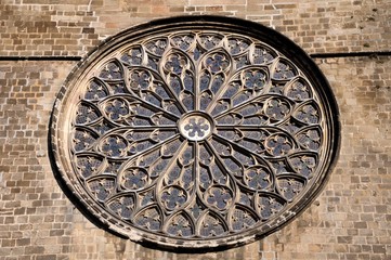 Rose - a large round mosaic window on the facade of churches of Roman and Gothic styles.