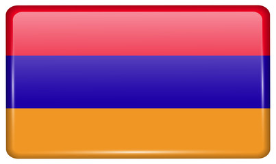 Flags Armenia in the form of a magnet on refrigerator with reflections light.