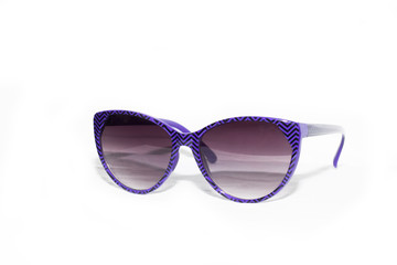 Glasses with a violet rim on a white background