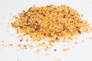 heap of sea salt with orange peel and chili pepper