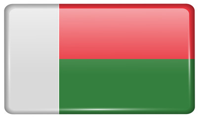 Flags Madagascar in the form of a magnet on refrigerator with reflections light.