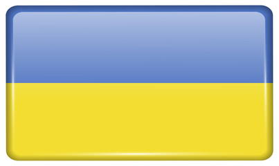 Flags Ukraine in the form of a magnet on refrigerator with reflections light.