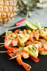 Prawns skewers with pineapple