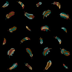 Colorful feathers embroidery seamless pattern. Boho tribal clothes indian bird classic embroidered background. Fashionable template design vector illustration