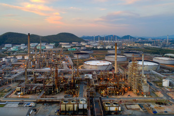 Aerial view of twilight of oil refinery ,Shot from drone of Oil refinery and Petrochemical plant at dusk , Bangkok, Thailand.