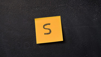 Sticky note with letter 