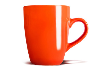 Orange coffe tea cup on white background with shadow, isolated.