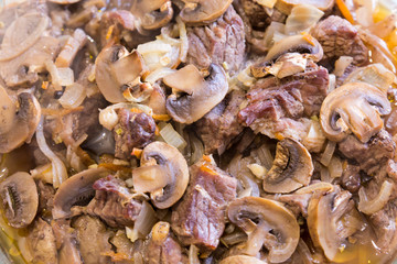 Beef stew with mushrooms and onions. Meat dish.
