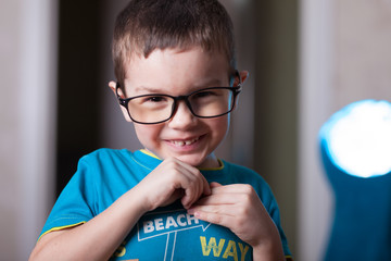 Glasses Boy. On photo my sщn. Make on Canon Mark ii with Sigma 85 mm. Saved in jpeg from Lr...