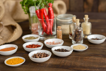 Various spices against a dark background. Food ingredients