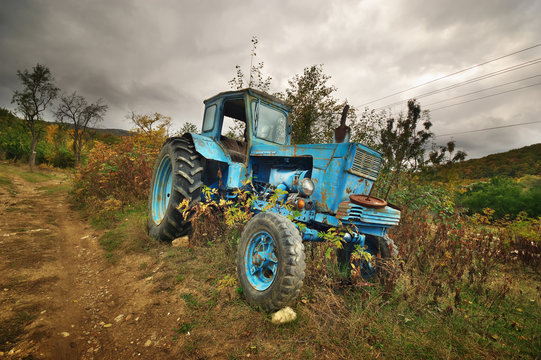 old abandoned rusty tractor